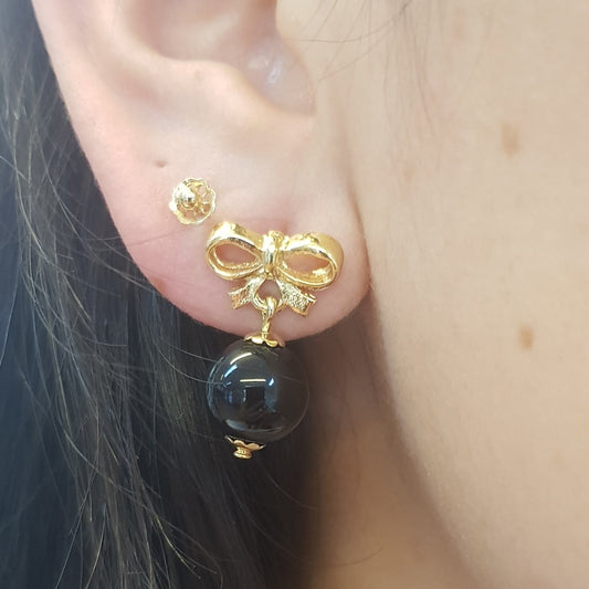 Pendientes lazos🎀 con Aletorio perla negra 🌑.