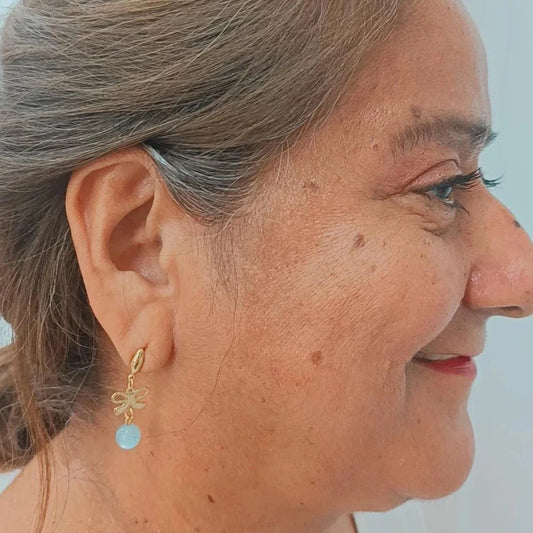 Pendientes  lazos🎀 con Aletorio piedra Aguamarina Gold.